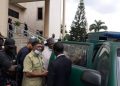 Commotion As EFCC operatives clash with prison officials over custody of Ex-pension boss, Maina [VIDEO]