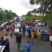 Travellers stranded in Edo as drivers block Benin/Auchi Road over kidnap of colleague [PHOTOS]