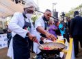Reactions As Whitemoney Is Spotted Cooking With Governor Sanwo-Olu at Lagos Food Festival [VIDEO + PHOTOS]