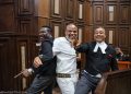 Nnamdi Kanu strikes a friendly pose with his lawyers [PHOTOS]