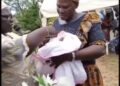 VIRAL VIDEO: See Moment Woman Prays That Newborn Will Be Among Those Who Use Pen To Embezzle Nigeria’s Money