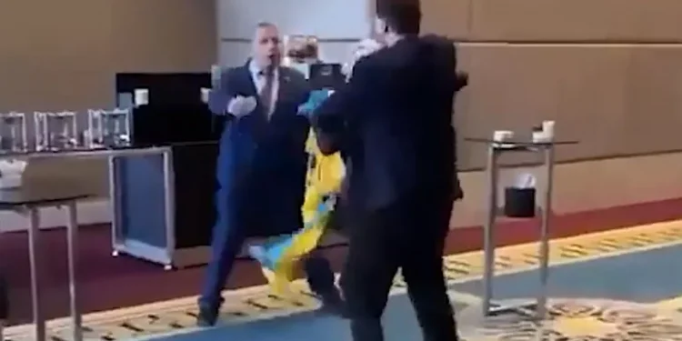 VIRAL VIDEO: Ukrainian MP Punches Russian Representative For Dragging His Country’s Flag From Him At A Conference In Turkey