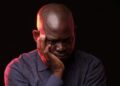 John Mayaiki: The Unstable Character Influenced By Filth Lucre